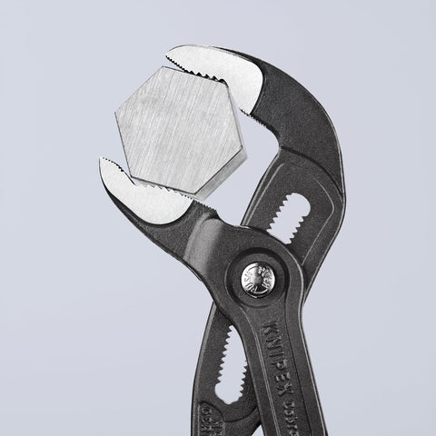 KNIPEX Cobra pliers with hardened teeth for long wear and grip reliability.