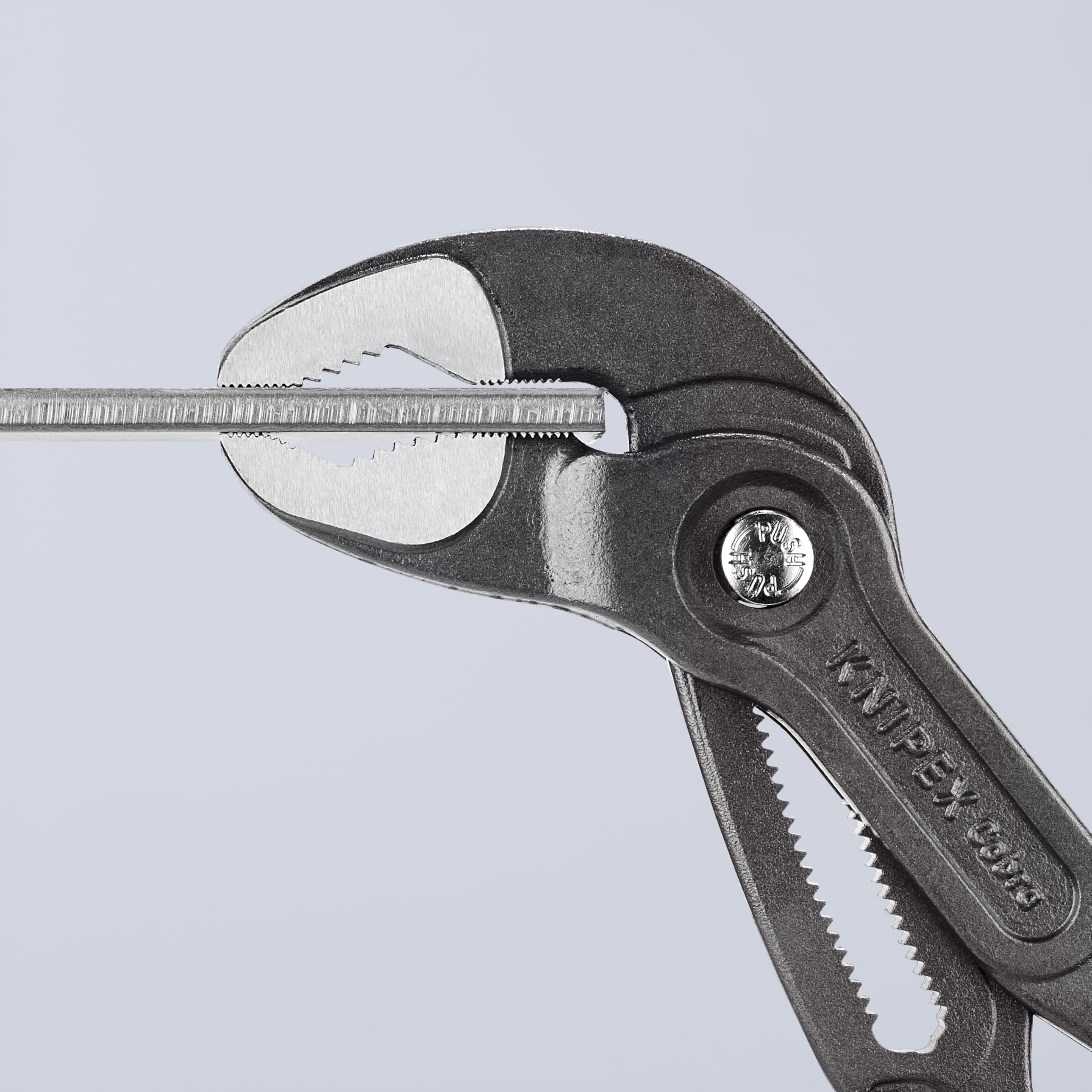 KNIPEX Cobra pliers showing secure hinge bolt catch to prevent shifting.