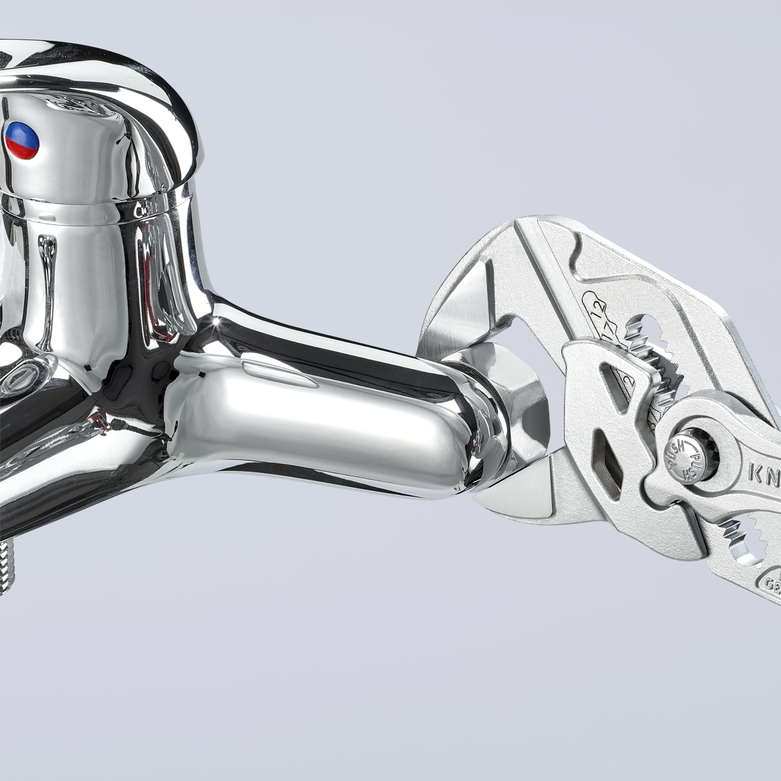 KNIPEX Cobra water pump pliers showing push-button adjustment capability