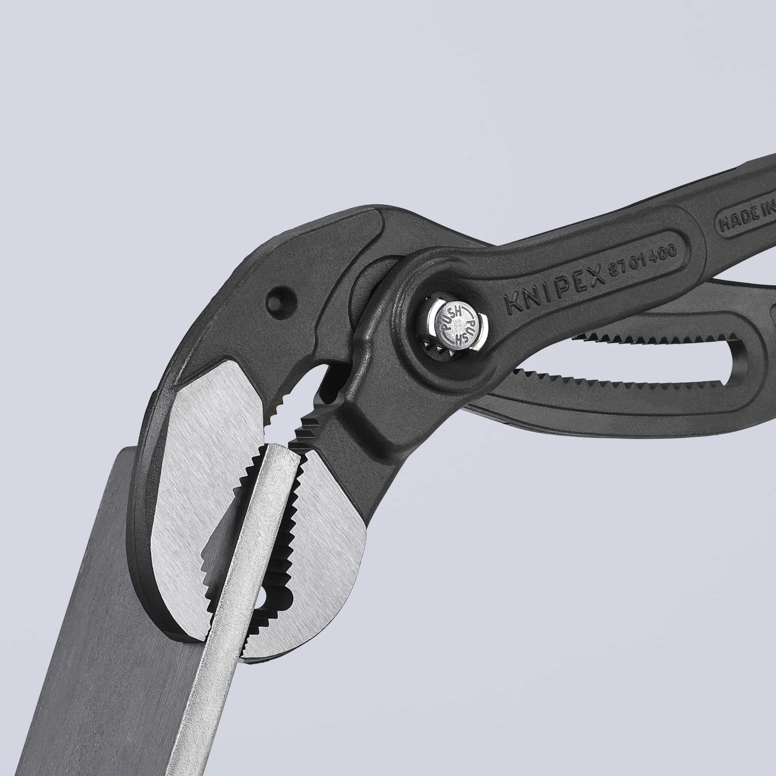 Pinch guard protects fingers on the KNIPEX Cobra XL16 during operation.