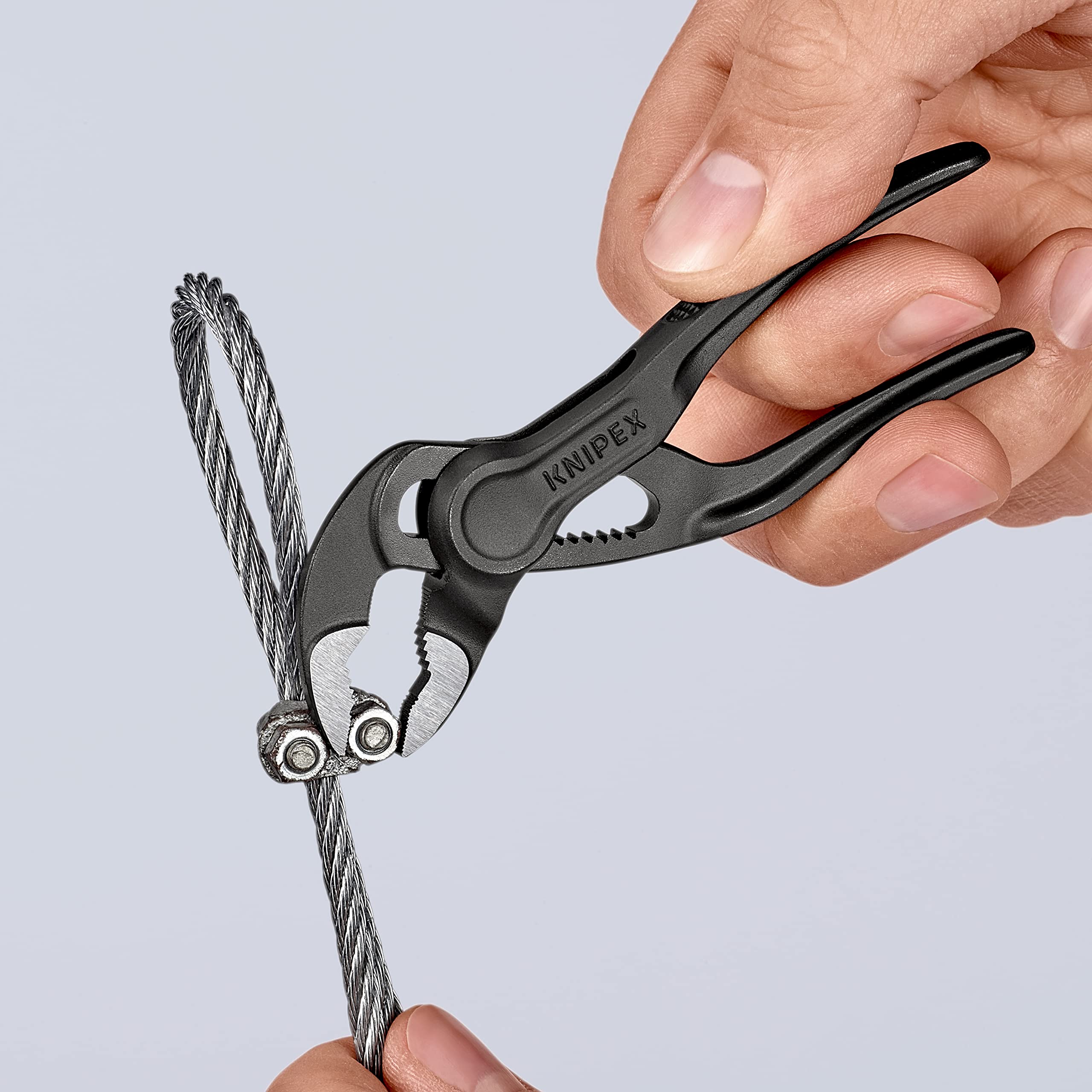 KNIPEX Cobra XS Mini grips nuts up to 24 mm and pipes up to 28 mm.