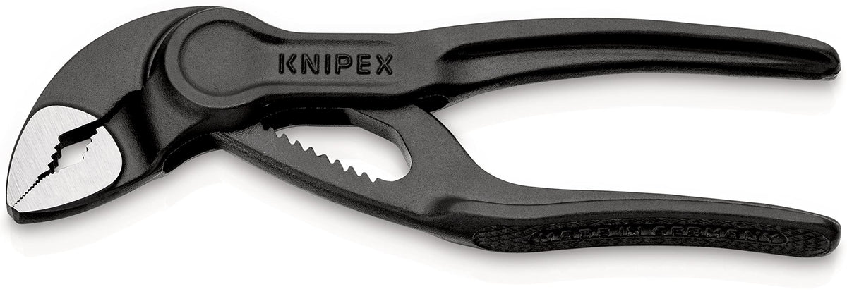 KNIPEX Cobra XS Mini Water Pump Pliers 100mm in action for confined spaces.