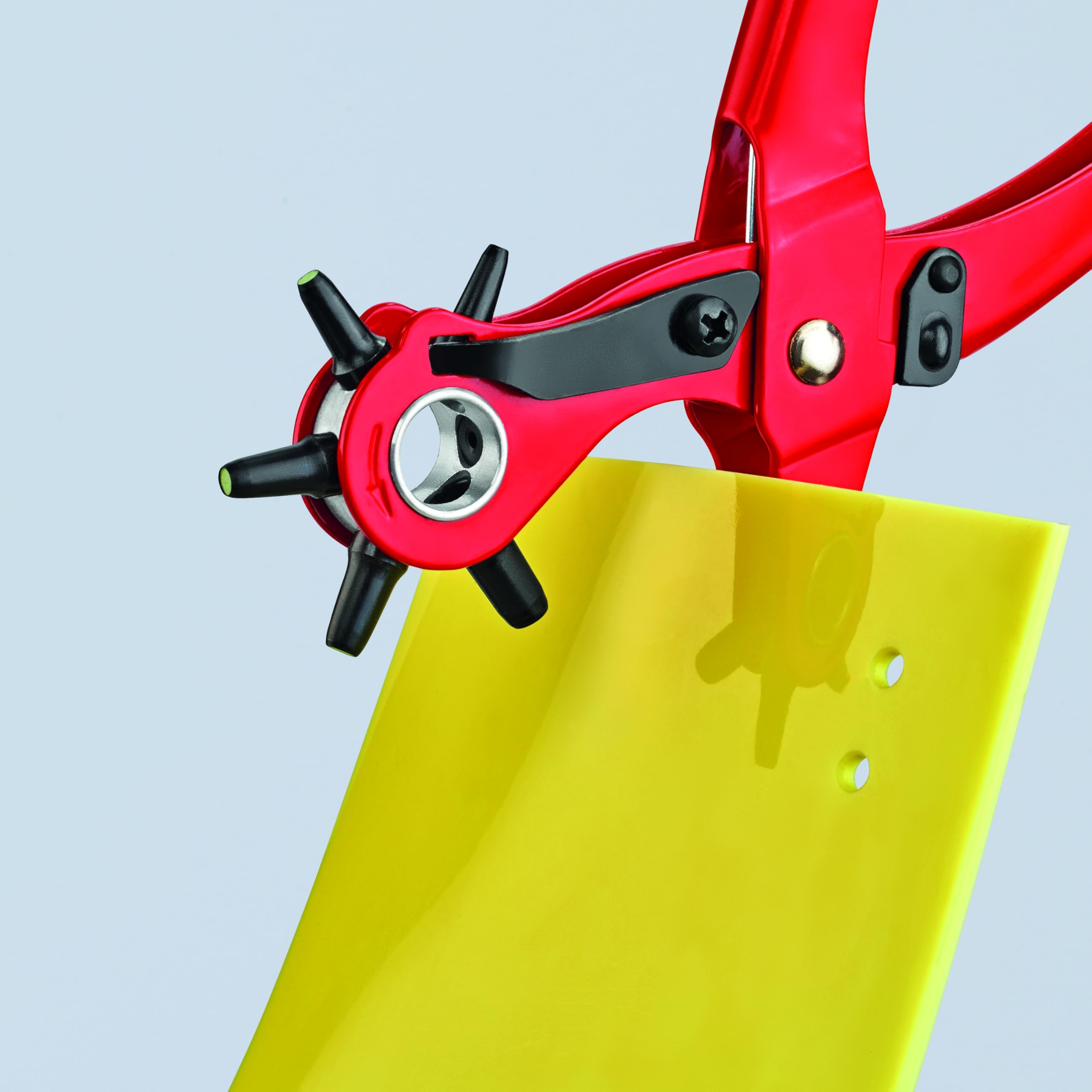 KNIPEX powder-coated finish resists rust during heavy-duty punching.