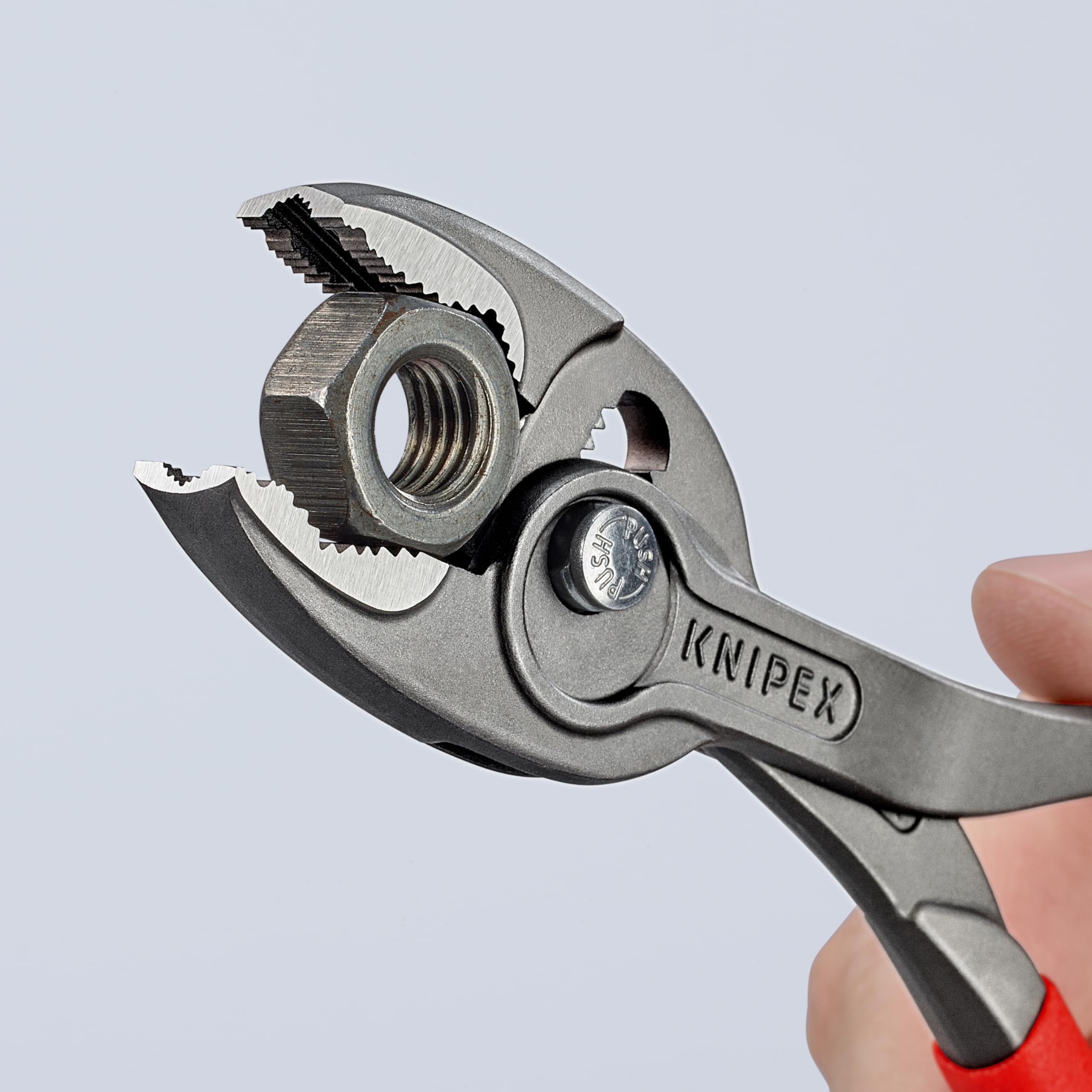 KNIPEX TwinGrip three-point system reinforces front gripping of flat workpieces.