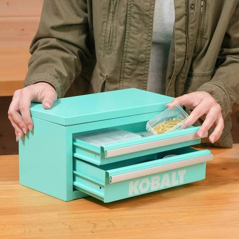 Kobalt mini toolbox teal in workshop setting for on-the-go tasks.