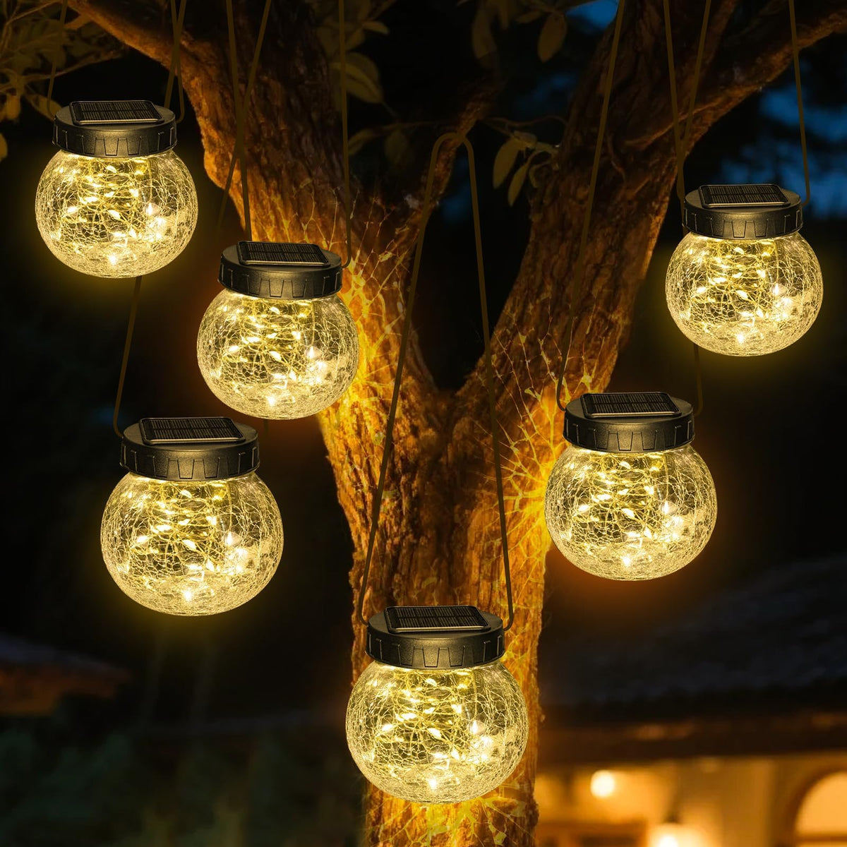 Kolpop cracked-glass lanterns 6-pack illuminating garden paths with warm ambiance