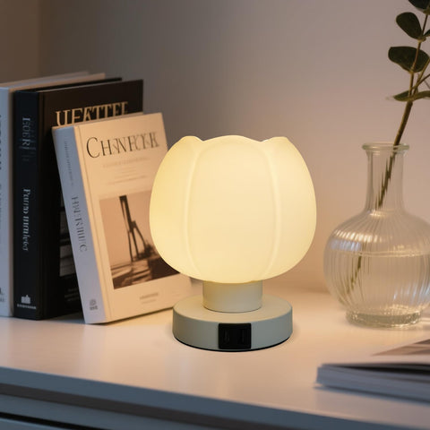 Komothala table lamp on a nightstand enhances a bedroom setup