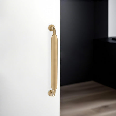 Champagne bronze finish detail on KOMOTIA pull showcasing smooth edges
