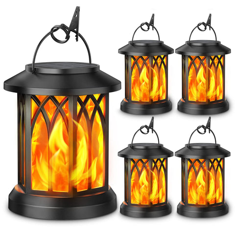 KOOPER 4-pack solar lanterns with dancing flame for elegant outdoor lighting.