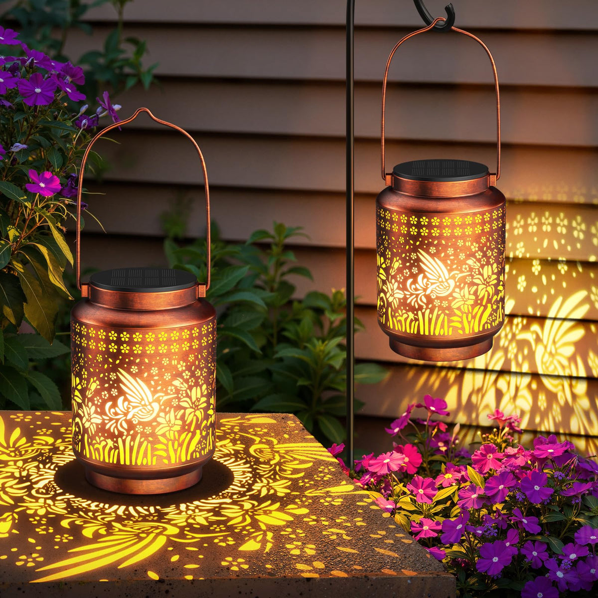 KOOPER hummingbird pattern lantern glowing at night for garden ambiance.