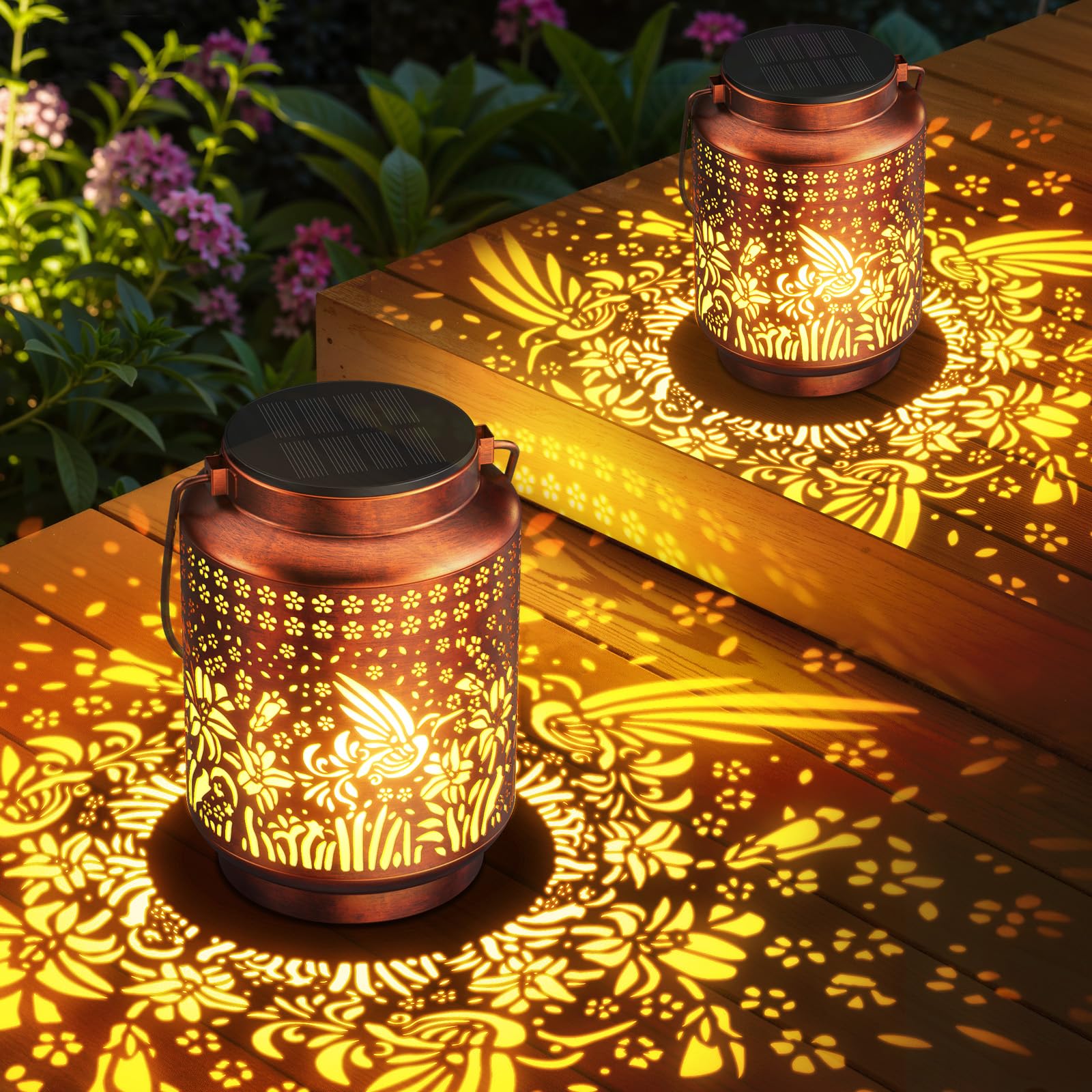 KOOPER lily pattern lantern illuminating pathways with soft, decorative garden lighting.