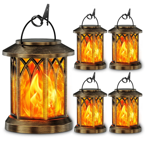 KOOPER solar lantern with dancing flame lights the outdoor path