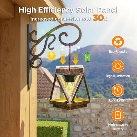 KOOPER bronze table-top lantern glows warmly along a garden dining area.