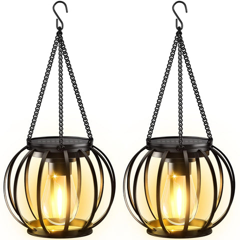 KOOPER vintage metal pumpkin lantern lights a garden path softly
