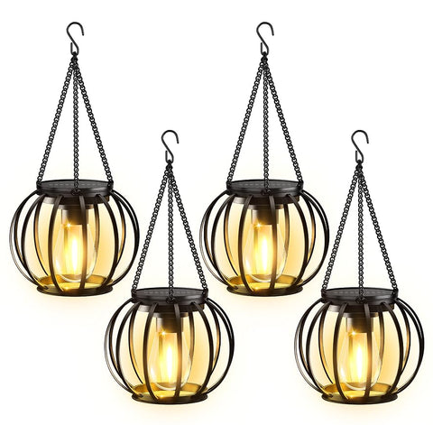 KOOPER solar lanterns outdoor waterproof 4-pack lighting a garden path with safe night visibility