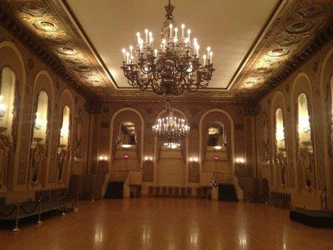 KOR flame-tip chandelier bulb for classic dining room ambiance.