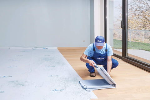 KORUSER paint-proof film protects floors from spills while you work