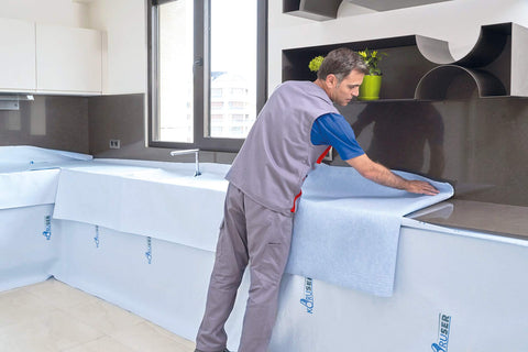 KORUSER protects stairs and edges from paint splashes and damage