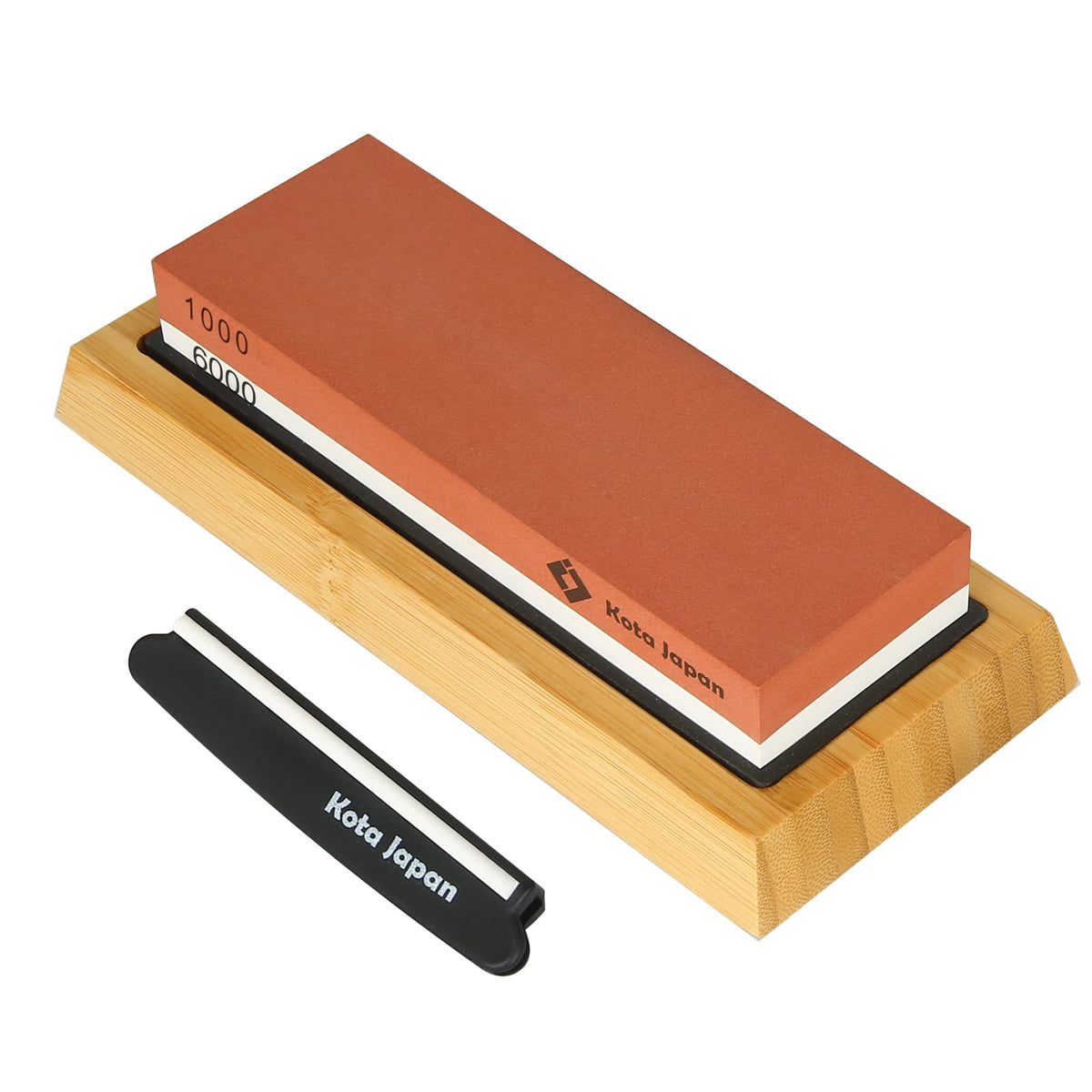 Kota Japan dual-grit whetstone on bamboo base ready for sharpening.