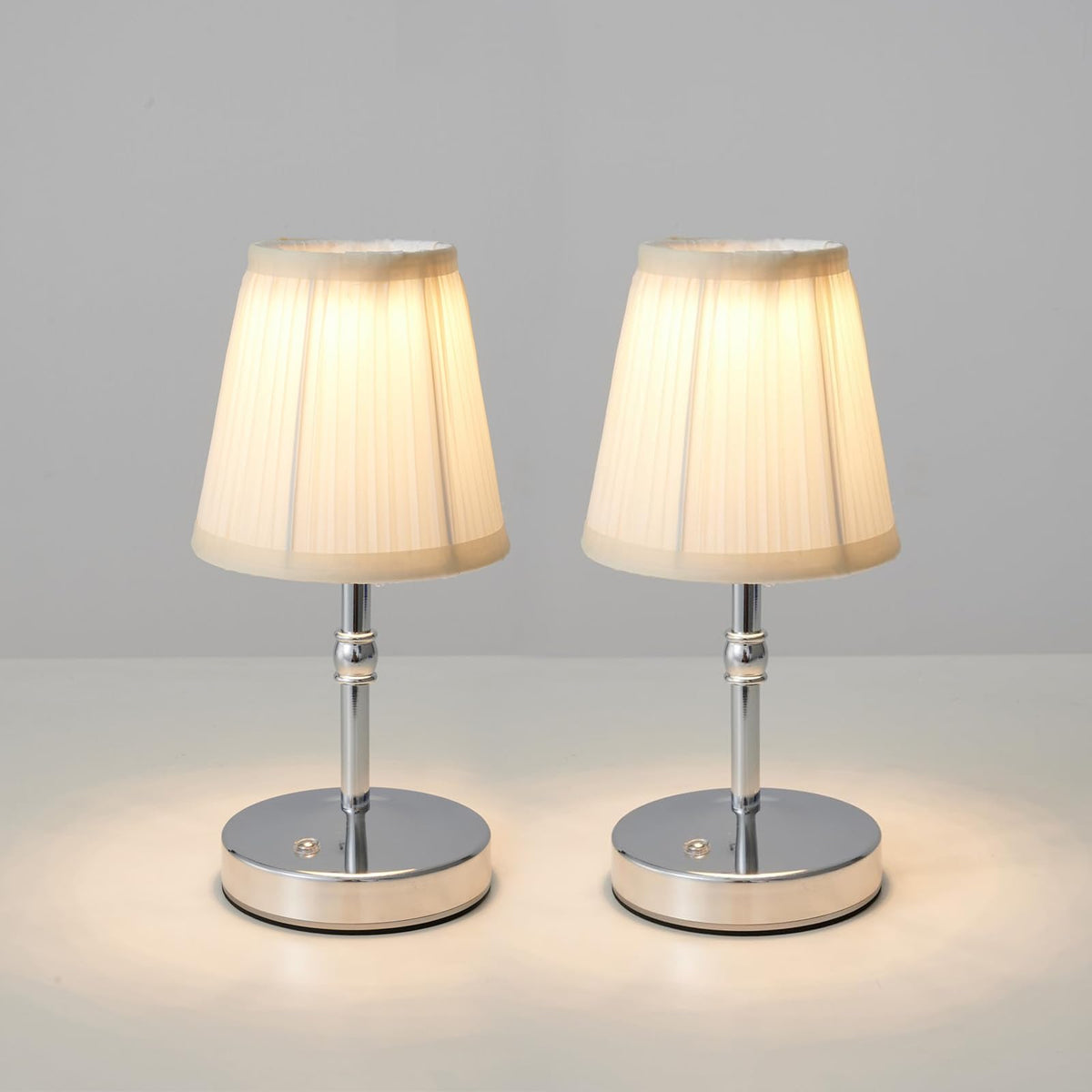 KPSHINE battery lamp in chrome finish, compact and cordless for clutter-free decor.