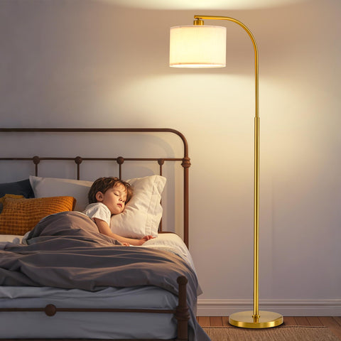 KQW tall floor lamp in a living room setup with warm ambience