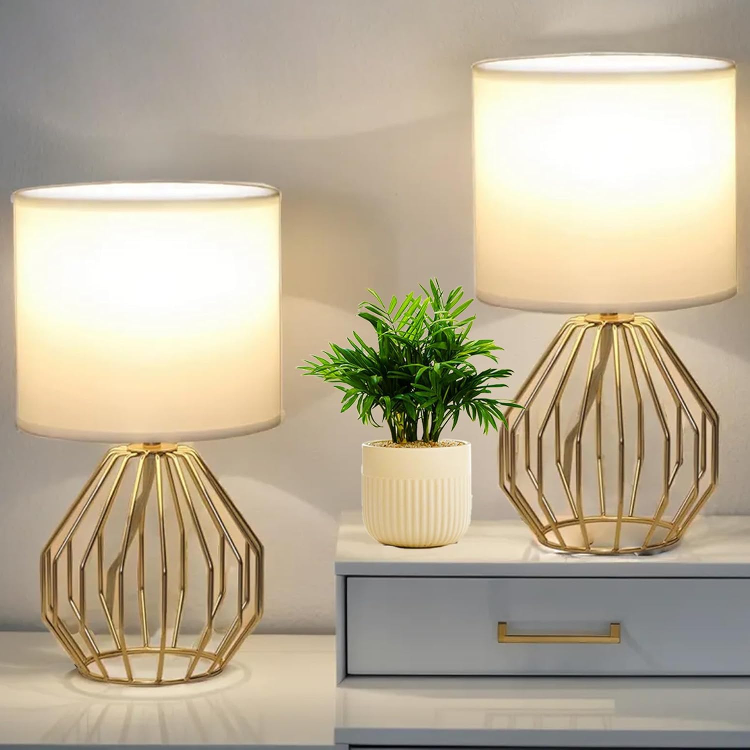 KRASTY small gold table lamp with white shade on a bedside table for soft illumination