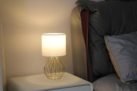 KRASTY small gold table lamp pairs with wood furniture for cozy spaces