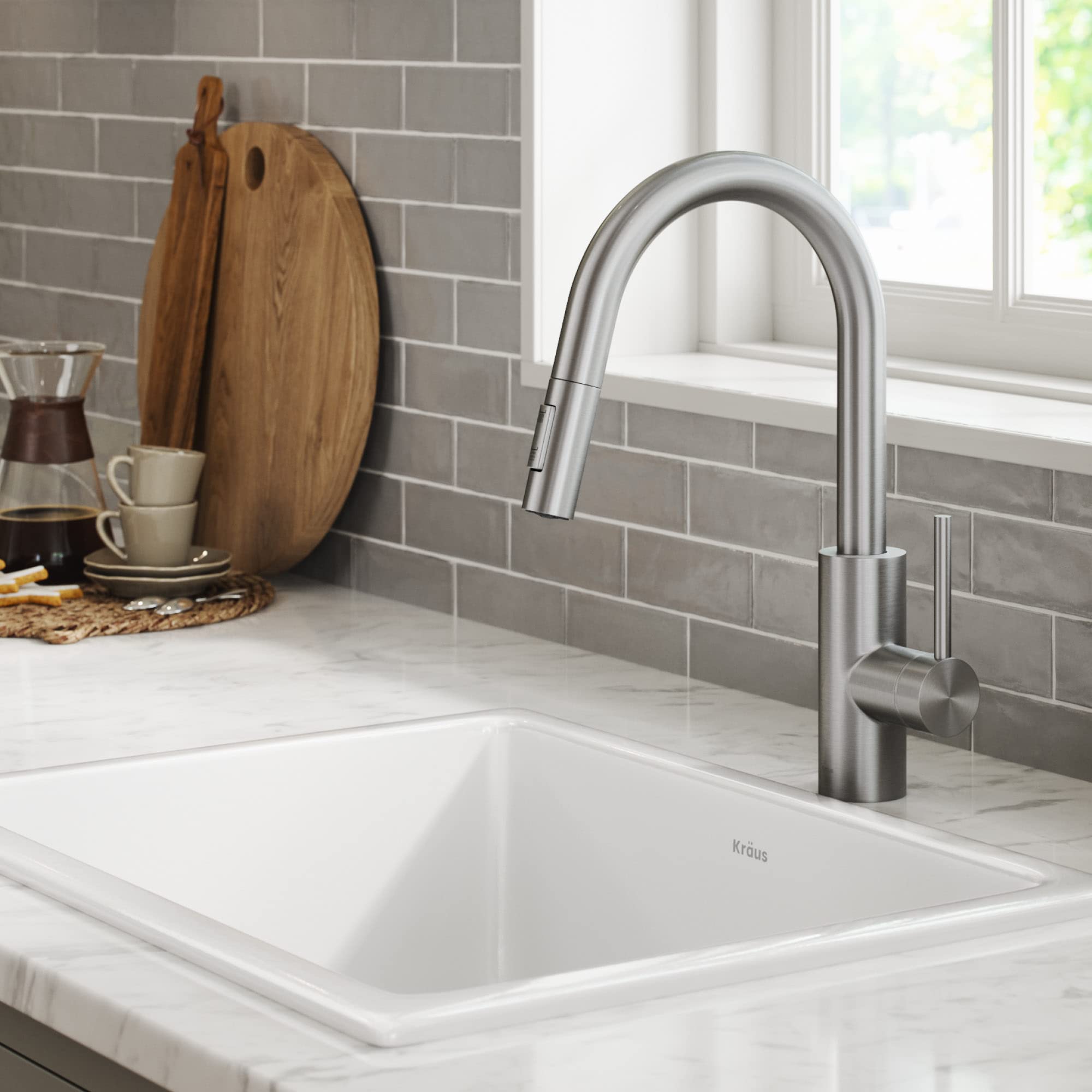 Kraus Oletto pull-down sprayer extended for full sink reach