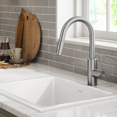 Kraus Oletto pull-down sprayer extended for full sink reach