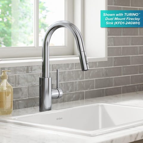 Kraus Oletto sprayer with retractable hose offers precise reach.