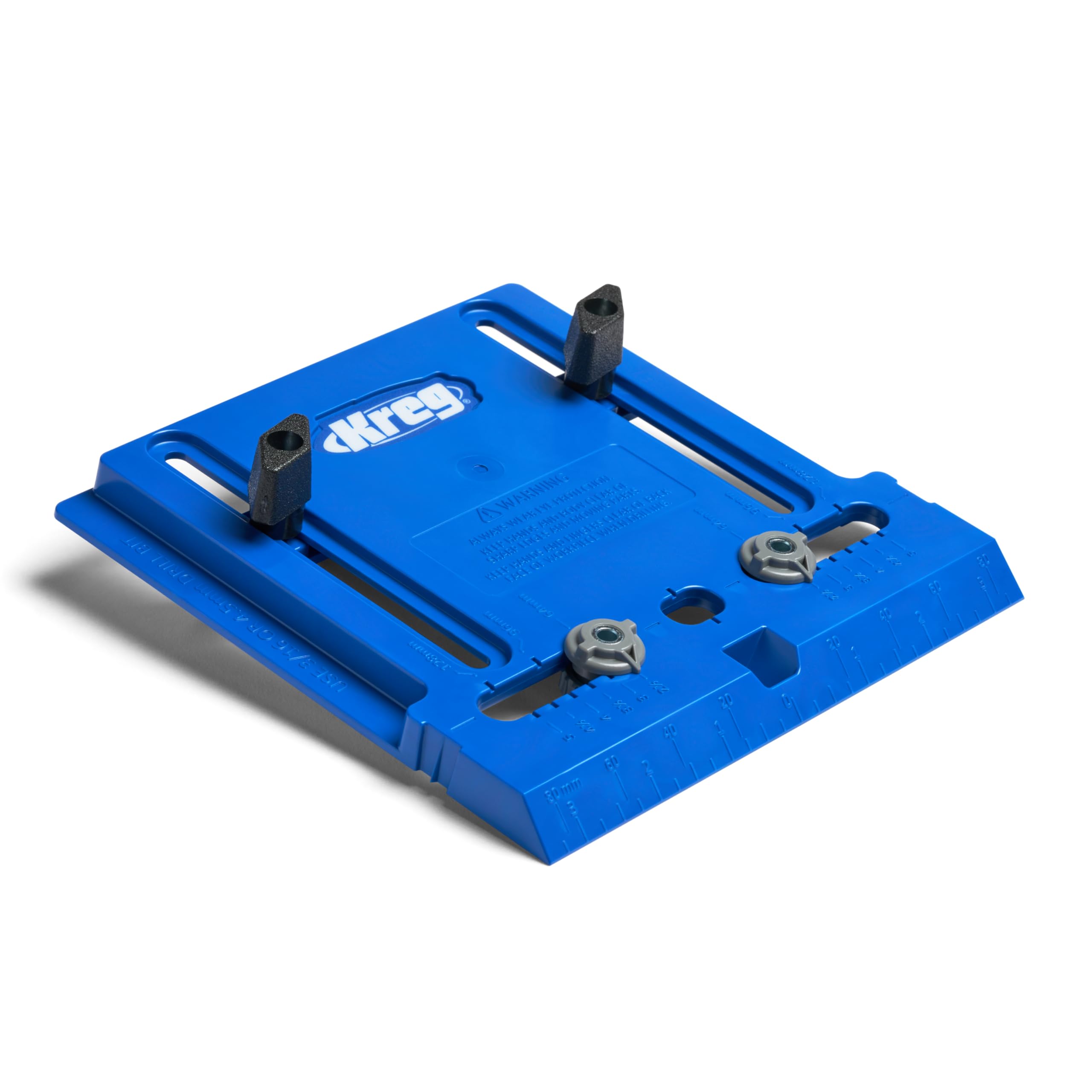 Kreg cabinet hardware jig edge guide in action for precise knob spacing.