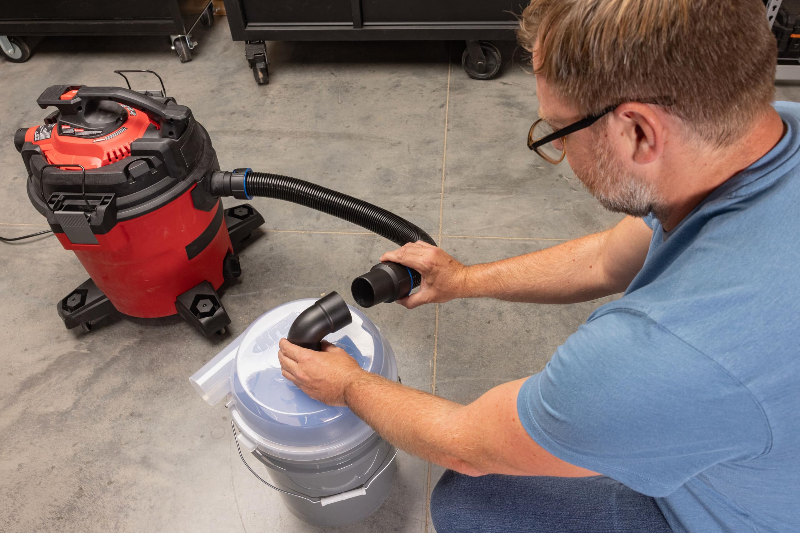 Kreg Dust Separator in use on a busy workshop floor with tools nearby.