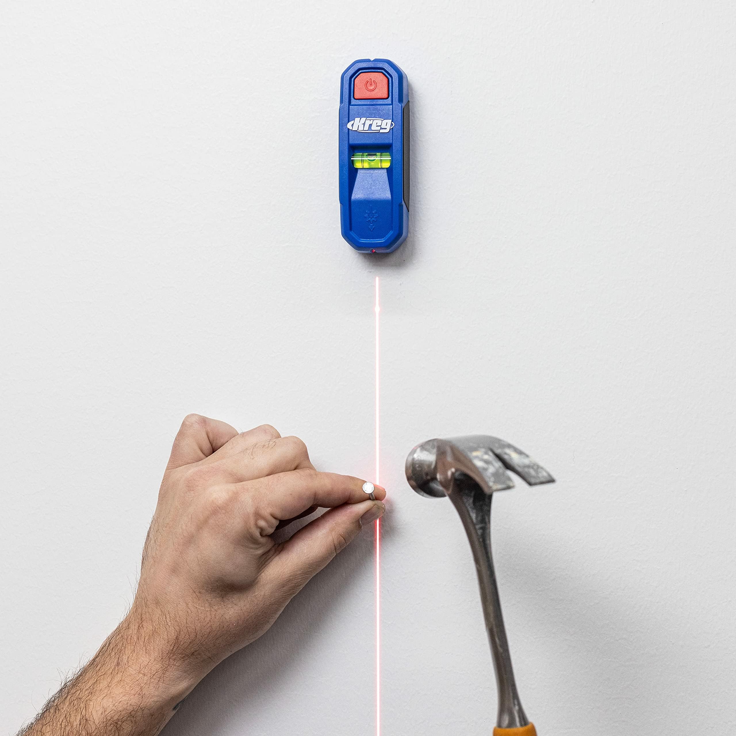 Kreg KMM1000LZ magnetic stud finder identifies screws and nails with magnets.