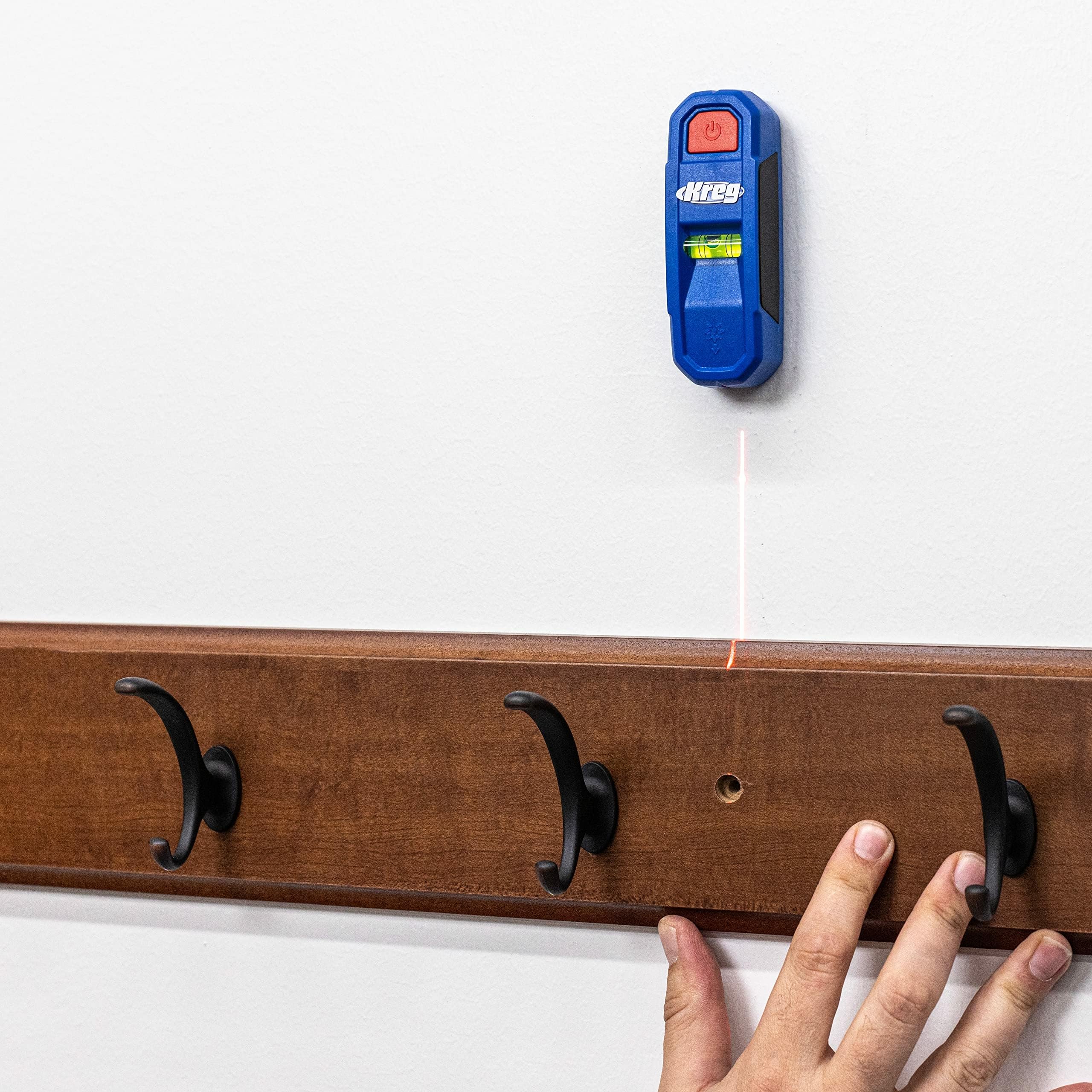 Kreg KMM1000LZ two magnets anchor the tool for stable wall checks.