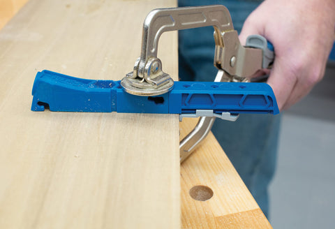 Kreg KPHJ310 anti-slip base keeps the jig steady during drilling.