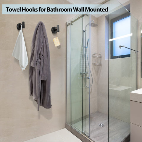 Kruodop towel hooks on bedroom door offering coat or bag support.