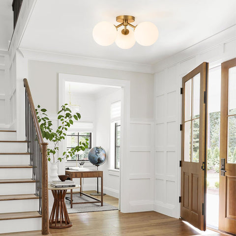 Kunlinzhu frosted globe shades diffuse soft light for cozy living room moments.