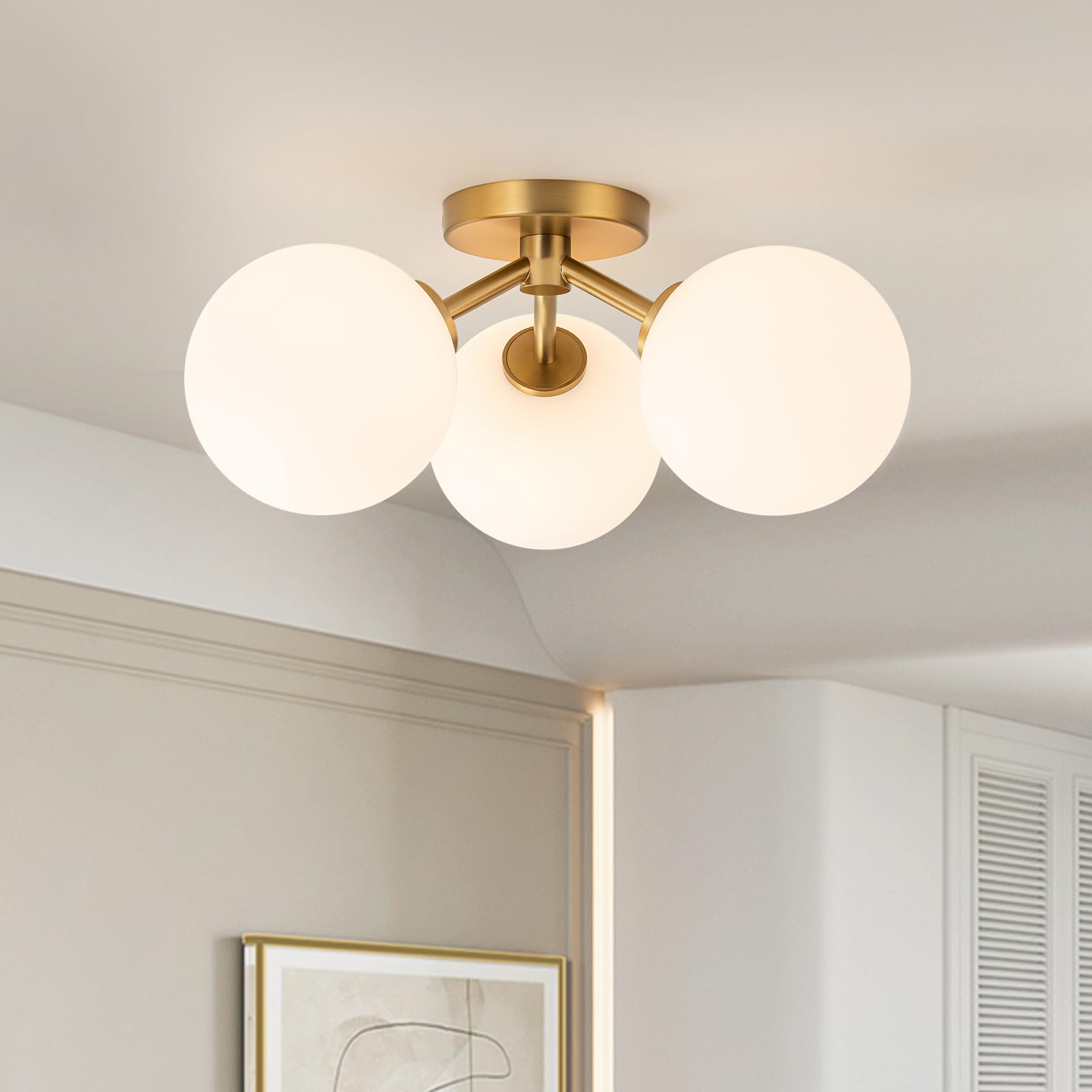 Kunlinzhu mid-century gold semi flush three globe shades create warm entryway illumination.