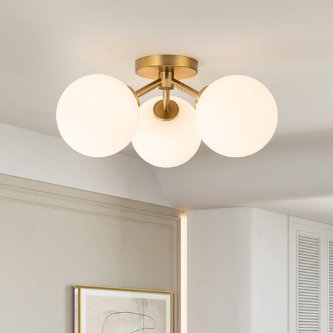 Kunlinzhu mid-century gold semi flush three globe shades create warm entryway illumination.