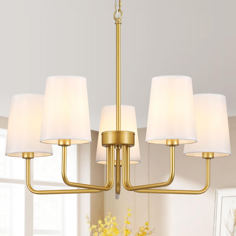 Kveosv modern gold chandelier over dining table with warm ambience