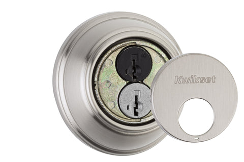 Close-up of Kwikset 816 satin nickel finish on modern door hardware.