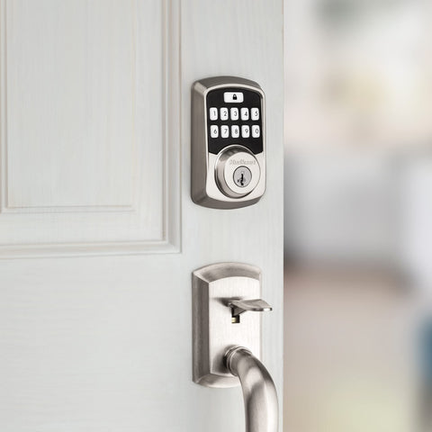 Kwikset Aura SmartKey security module enabling rapid re-keying.