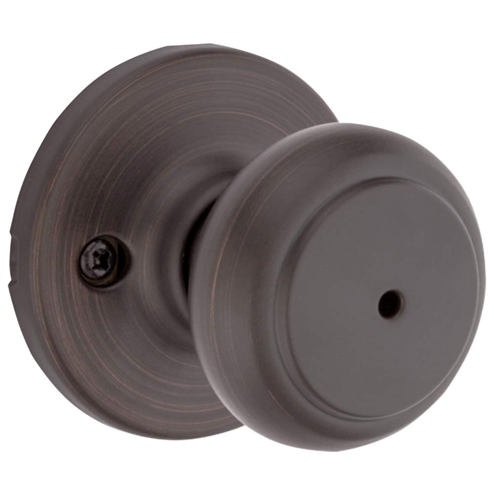 Kwikset Cove interior privacy knob with lock, ideal for private bedroom or bathroom doors.