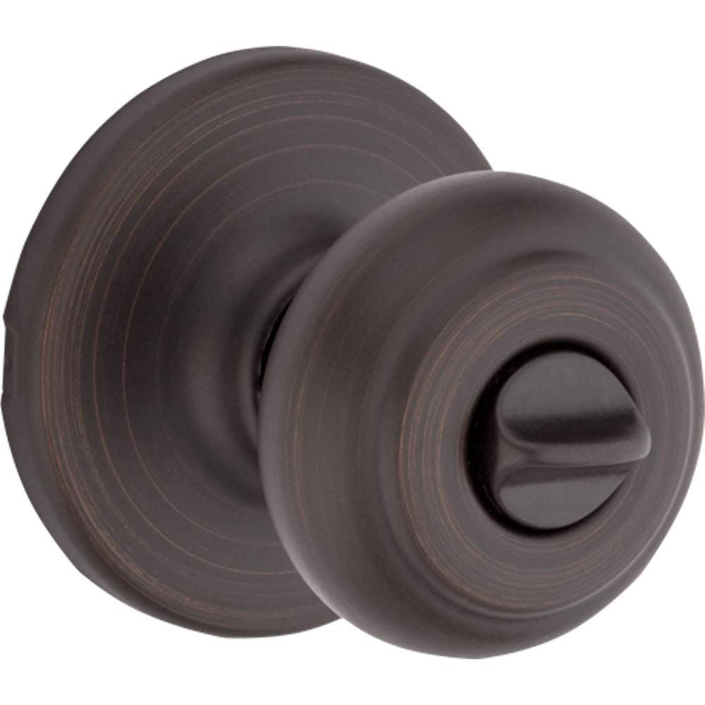 Kwikset Cove Venetian Bronze finish close-up showcasing a classic, durable look.