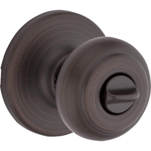 Kwikset Cove Venetian Bronze finish close-up showcasing a classic, durable look.