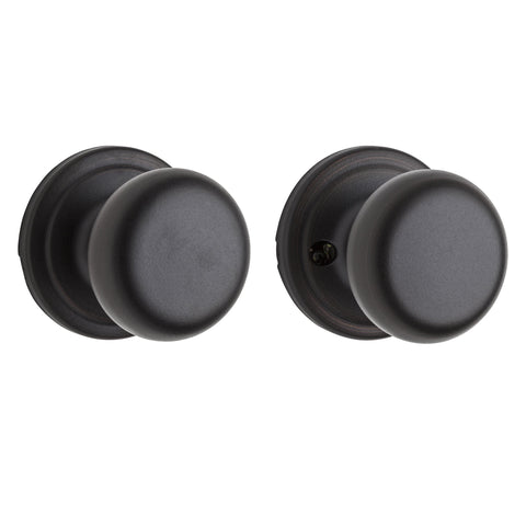 Kwikset Hancock interior passage knob close-up in Venetian Bronze showing durable finish and Microban protection