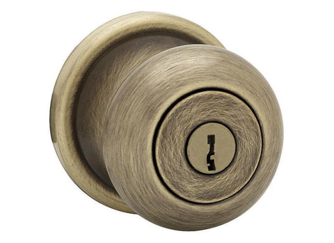 Kwikset Juno entry knob front exterior in antique brass shows secure entry for home use