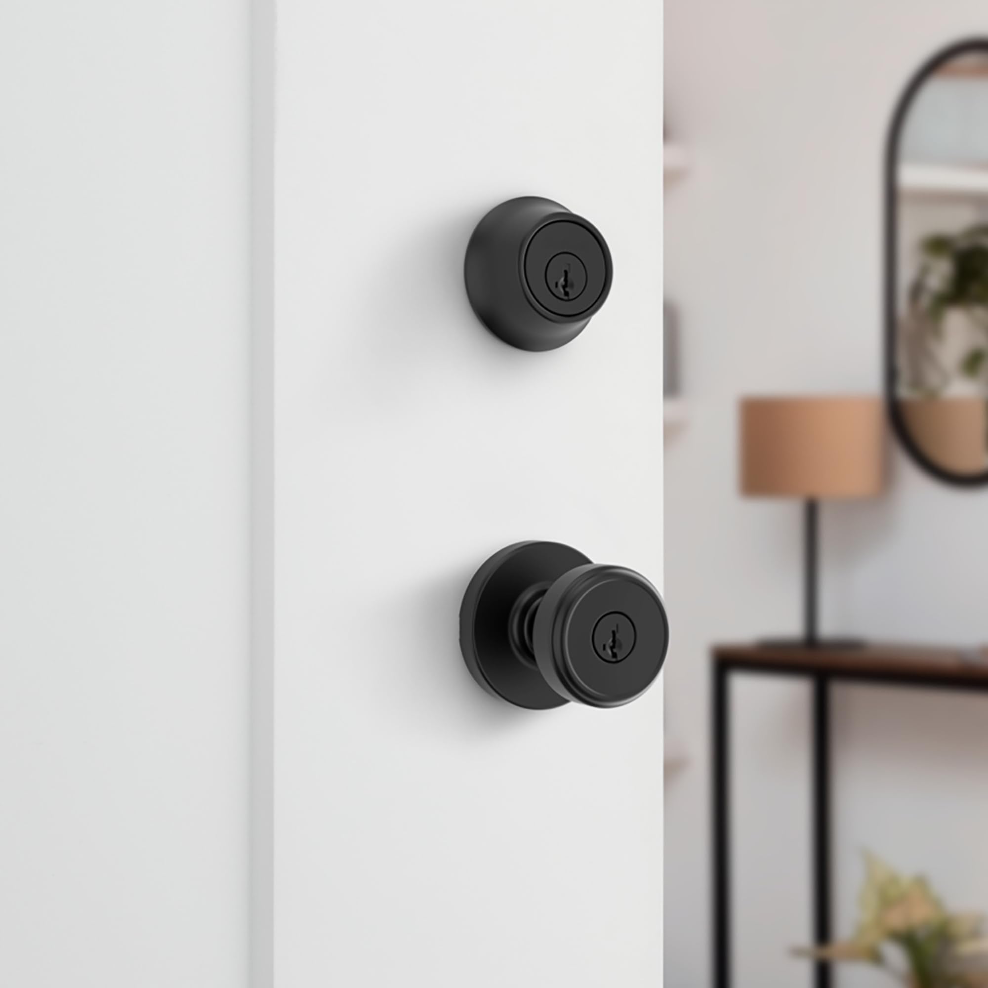 Kwikset Maven deadbolt closeup showing low-profile design and sleek look