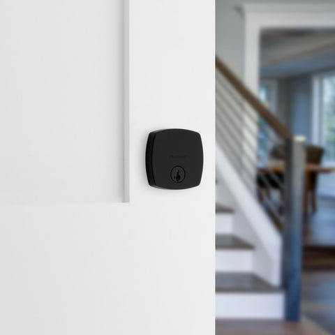Kwikset Midtown deadbolt interior thumb-turn for convenient locking.
