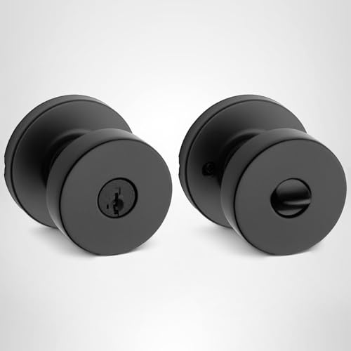 Kwikset Pismo iron black finish on a modern entry door